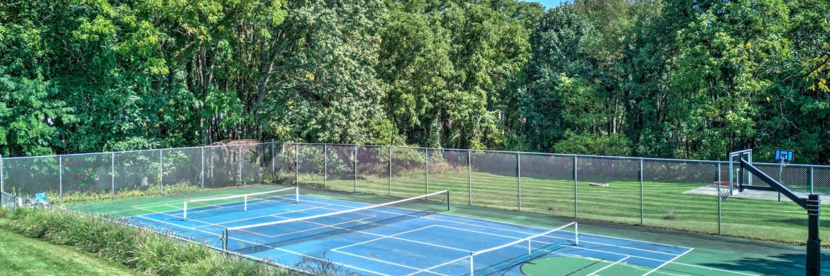 Pickleball court in a beautiful wooded setting